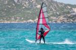 Porto Pollo, Sardinia/italy - May 21 : Windsurfing At Porto Poll Stock Photo