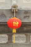 Red Chinese Lamp Behind Church Stock Photo