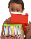 Happy Girl Receiving Gifts Stock Photo