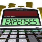 Expenses Calculator Shows Business Expenditure And Bookkeeping Stock Photo