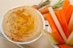 Fresh Hummus Dip With Raw Carrot And Celery Stock Photo