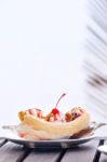 Banana Split Ice Cream With Whipped Cream And Cherry Stock Photo