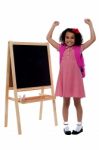 Excited Beautiful Little Girl In School Uniform Stock Photo