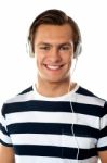 Young Male Listening Music Stock Photo