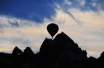 A Balloon Among The Valley At Cappadocia, Turkey Stock Photo