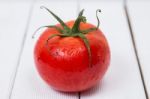 Tasty Tomato On A White Background Stock Photo