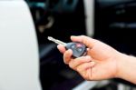 Women Hand Holding Car Key Stock Photo