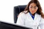 Close Up Of Doctor Looking In Computer Stock Photo