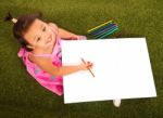 Child Drawing With Pencils Stock Photo