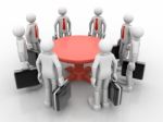 3d Businessmen Standing  At A Round Table And Having Business Me Stock Photo