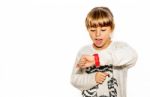 Eight Year Old Girl Looking At Her Watch Surprised At What Time It Is Stock Photo