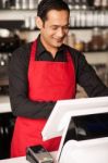 Barista Staff Placing Customers Order In Queue Stock Photo