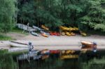 Rowing Boats Moored On Loch Insh Stock Photo