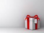 Empty White Wall With Gift Box Stock Photo