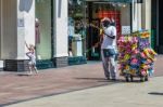 Man Generating Lots Of Bubbles In The Shopping Centre At Royal Tunbridge Wells Stock Photo