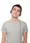 Casual Man Listening Music Stock Photo