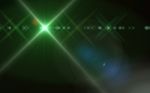 Beautiful Abstract Image Of Lens Flare With Black Background.green Shine On Black Background Stock Photo