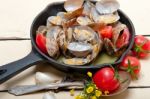 Fresh Clams On An Iron Skillet Stock Photo