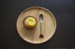 Portuguese Egg Tart On A Wood Dish Stock Photo