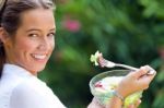 Beautiful Young Woman Holding Green Salad, Outdoors Stock Photo