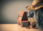 Clothing And Bags On  Wooden Stock Photo