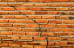 The Crack Wall From Brick And Brick Background, Red Crack Brick And Pattern Of Crack Brick Wall Background Stock Photo