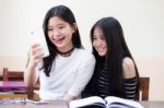 Two Asia Thai High School Student Uniform Best Friends Beautiful Girl Reading Book Stock Photo