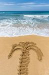 Drawing Of Palm Tree On Sandy Beach Stock Photo