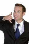 Businessman Posing Calling Hand Gesture Stock Photo