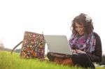 Young Girl Using Laptop Stock Photo