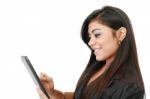 young Woman pressing Tablet PC Stock Photo