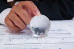 Globe With Chart Papers Stock Photo