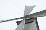 Wind Turbine Low Angle With Sky Background Stock Photo