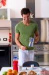 Man In Kitchen With Coffee Stock Photo