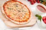 Italian Original Thin Crust Pizza Stock Photo