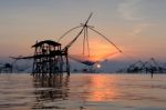 Silhouette Square Dip Net With Sunrise Background In Patthalung, Stock Photo