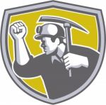 Coal Miner Clenched Fist Pick Axe Shield Retro Stock Photo