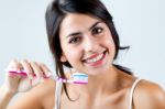 Beautiful Young Woman Picking His Teeth Stock Photo