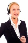 Businesswoman With Headset Stock Photo