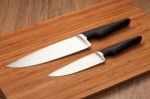 Knives On Cutting Board Stock Photo