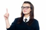 Schoolgirl Showing Pointing Upwards Stock Photo