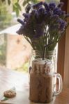 Iced Coffee On Wooden Table Top Stock Photo