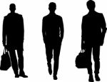 Silhouette men carrying bags Stock Photo