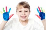 Smiling Girl Showing Her Painted Palms Stock Photo