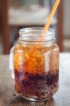 Glass Of Cola With Ice On Wooden Table Stock Photo