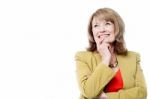 Portrait Of A Beautiful Thoughtful Woman Smiling Stock Photo