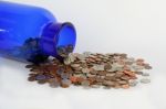 USA Coins In Blue Jar Stock Photo