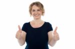 Aged Woman Showing Thumbs Up Stock Photo