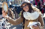 Young Beautiful Woman Shopping In A Market Stock Photo