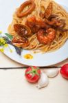 Italian Seafood Spaghetti Pasta On Red Tomato Sauce Stock Photo